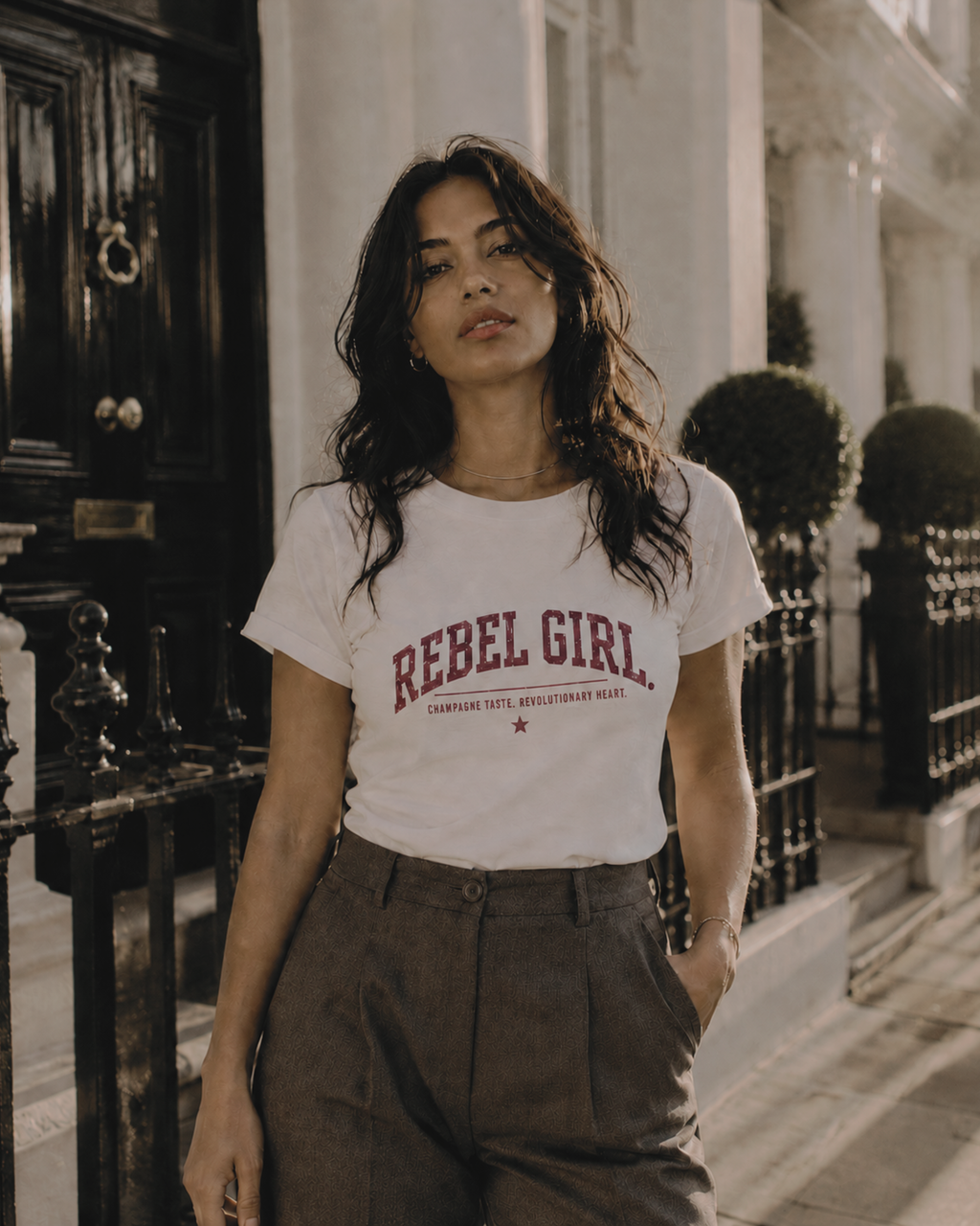 "REBEL GIRL - CHAMPAGNE TASTE, REVOLUTIONARY HEART" WOMEN'S EXTENDED SHOULDER T-SHIRT